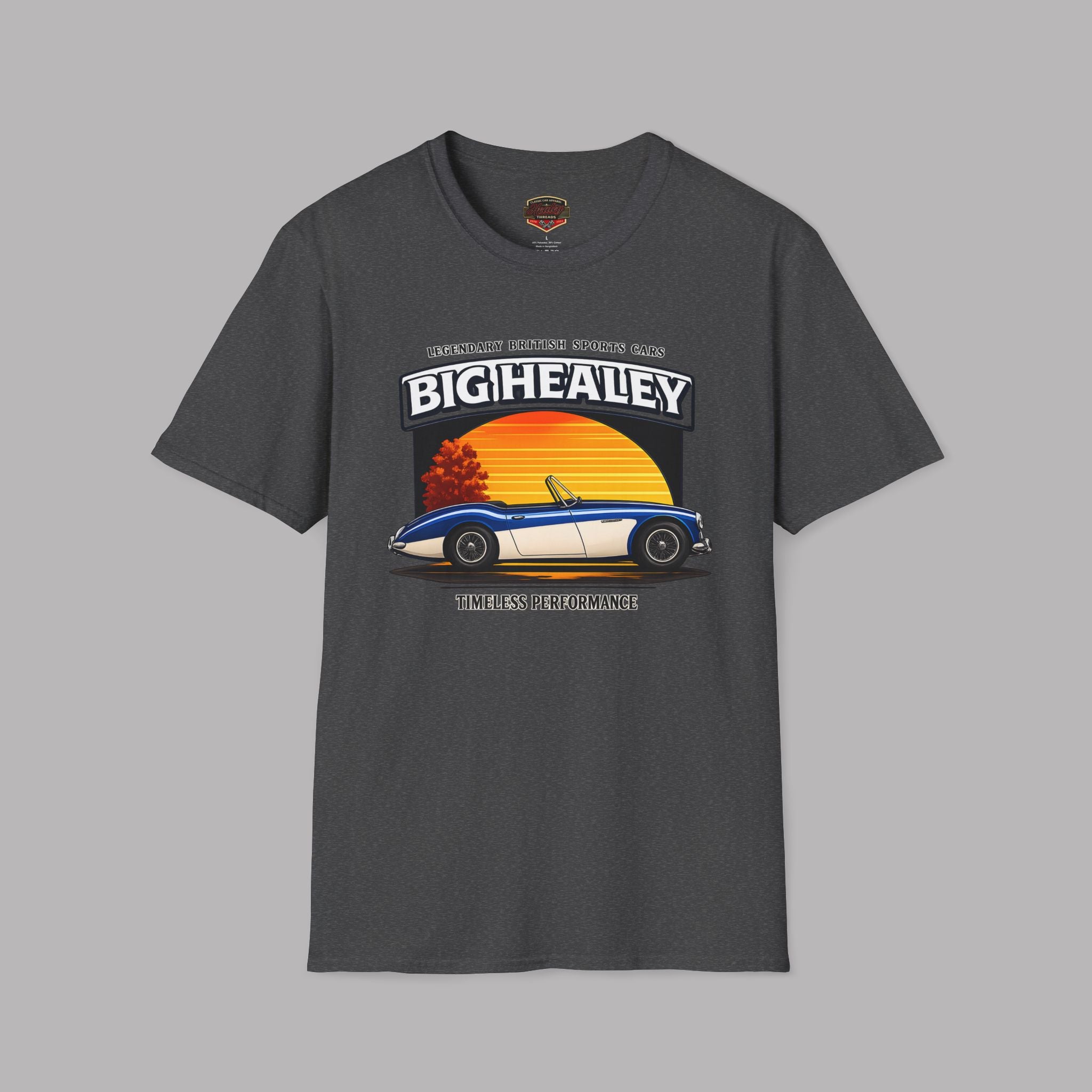 Big Healey graphic dark heather colored t-shirt featuring a blue and white Austin Healey roadster with retro sunset artwork and vintage British sports car typography by Healey Threads