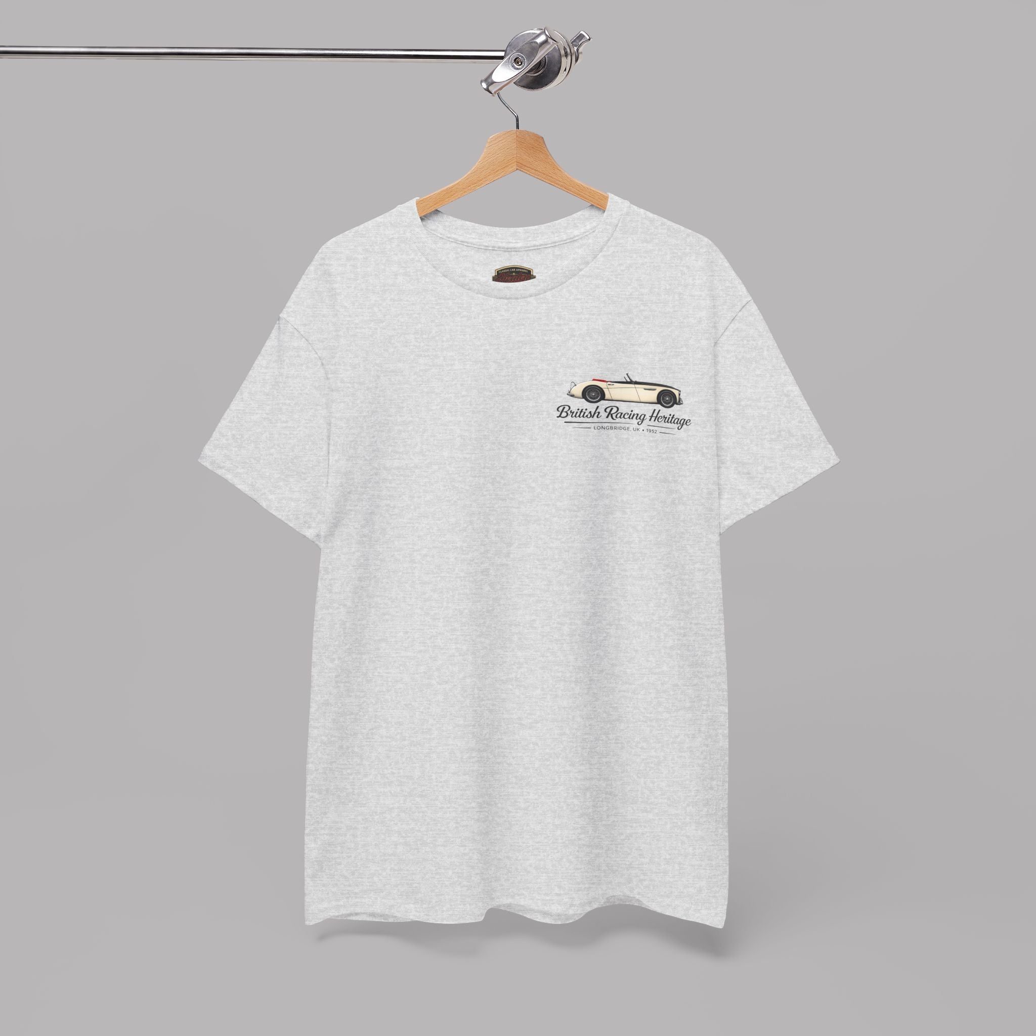 Ash t-shirt with a Healey car graphic with black text on a hanger against a gray background