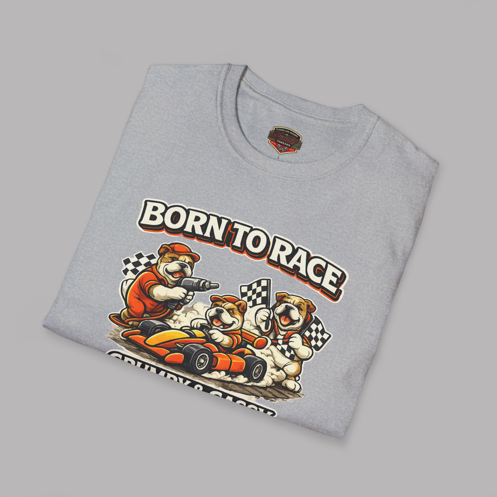 Folded gray t-shirt with 'Born to Race' graphic design on a gray background