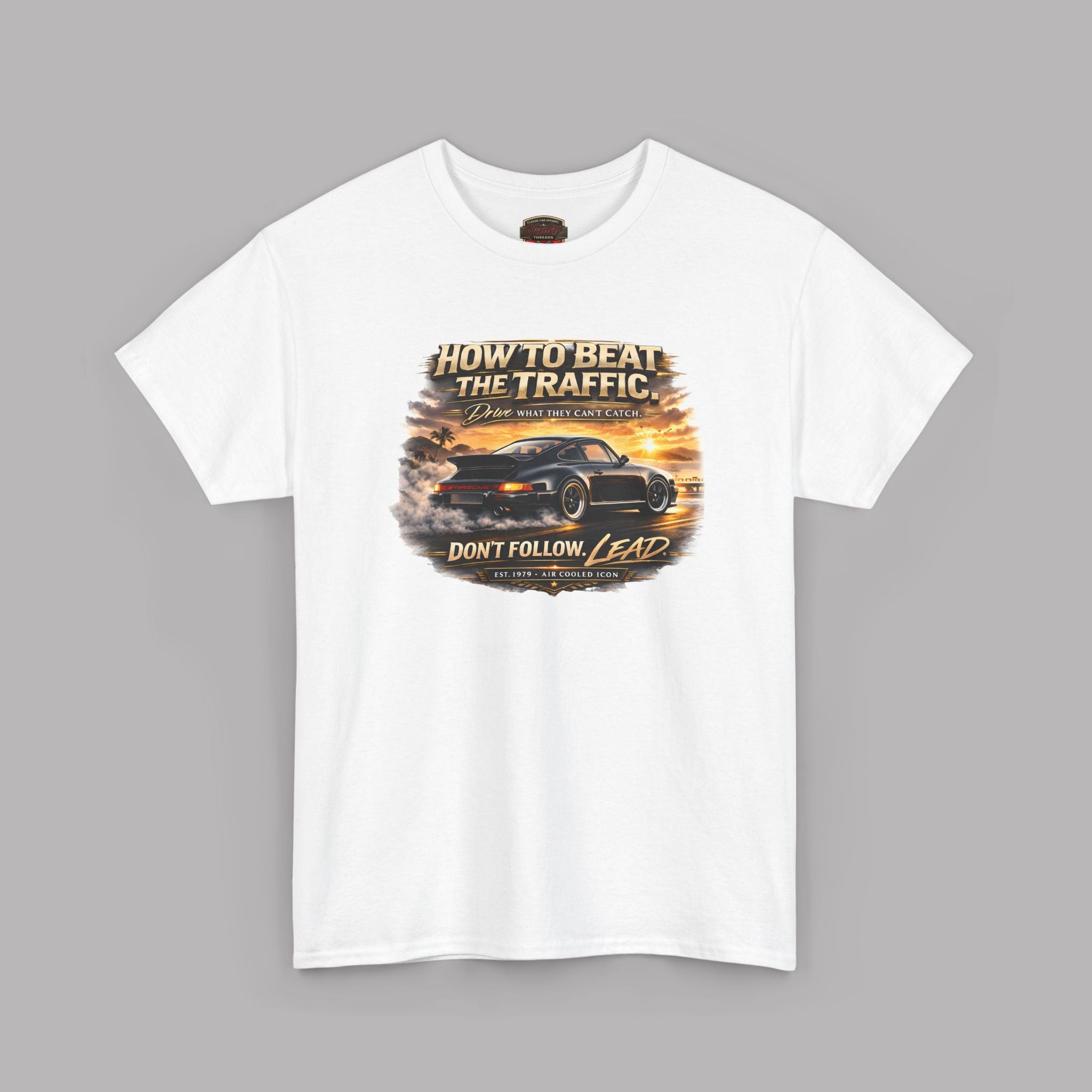White t-shirt with a classic car graphic design on a gray background