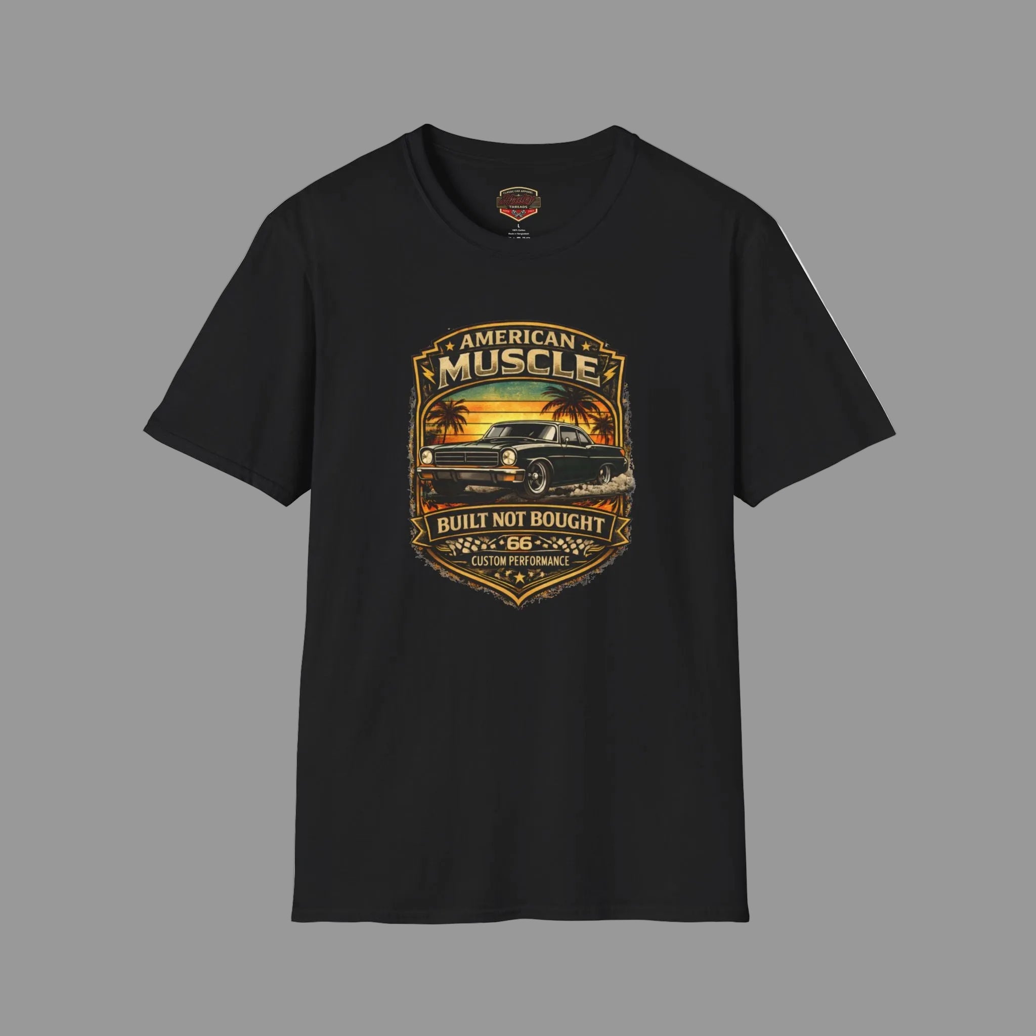 Black t-shirt with 'American Muscle' car graphic design on a gray background