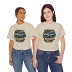 Two girls wearing beige t-shirts with a graphic of a car and text on a white background