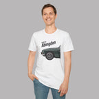 Man wearing a white t-shirt with a classic car graphic and text on a gray background