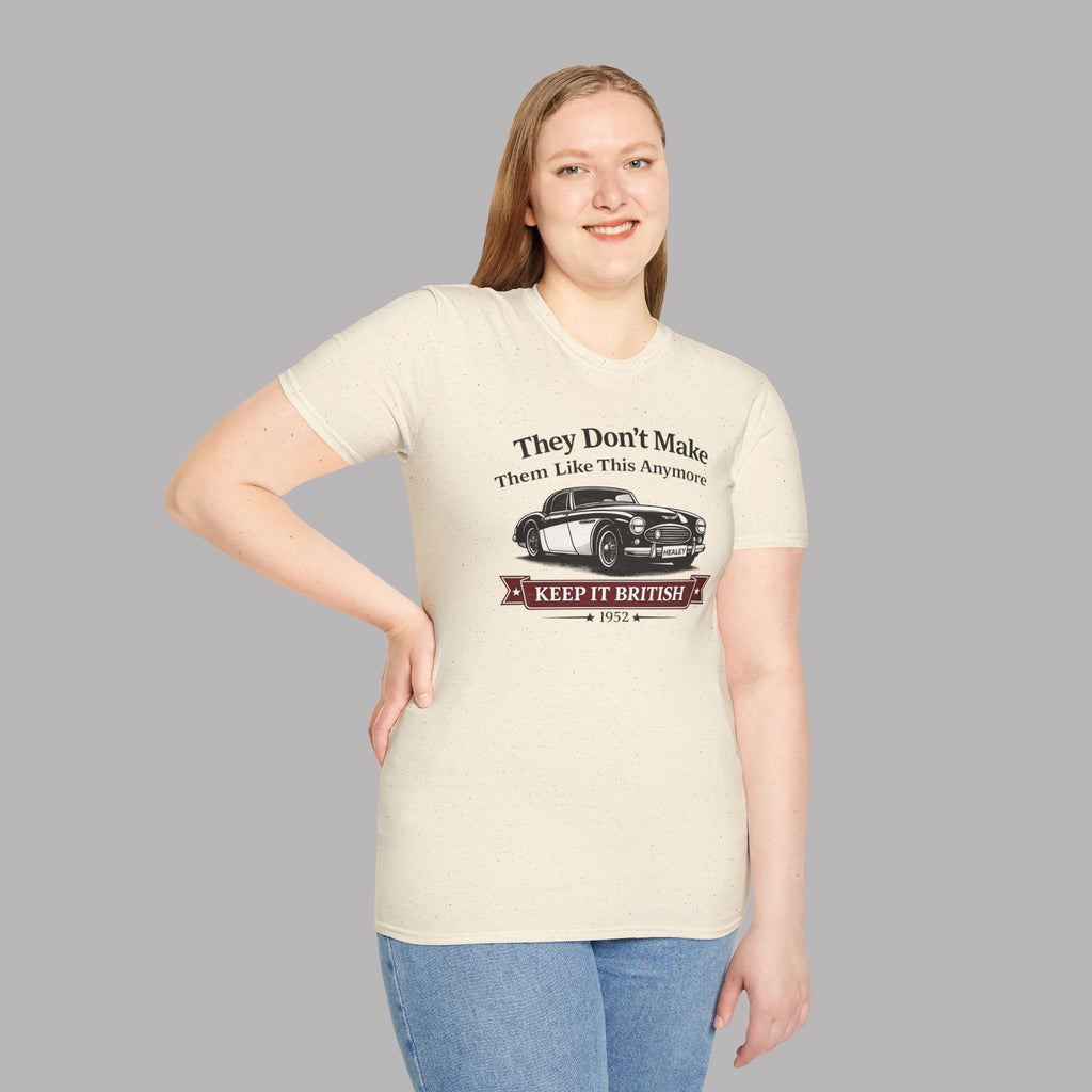 Girl wearing a natural t-shirt with a Healey car graphic and text on a gray background