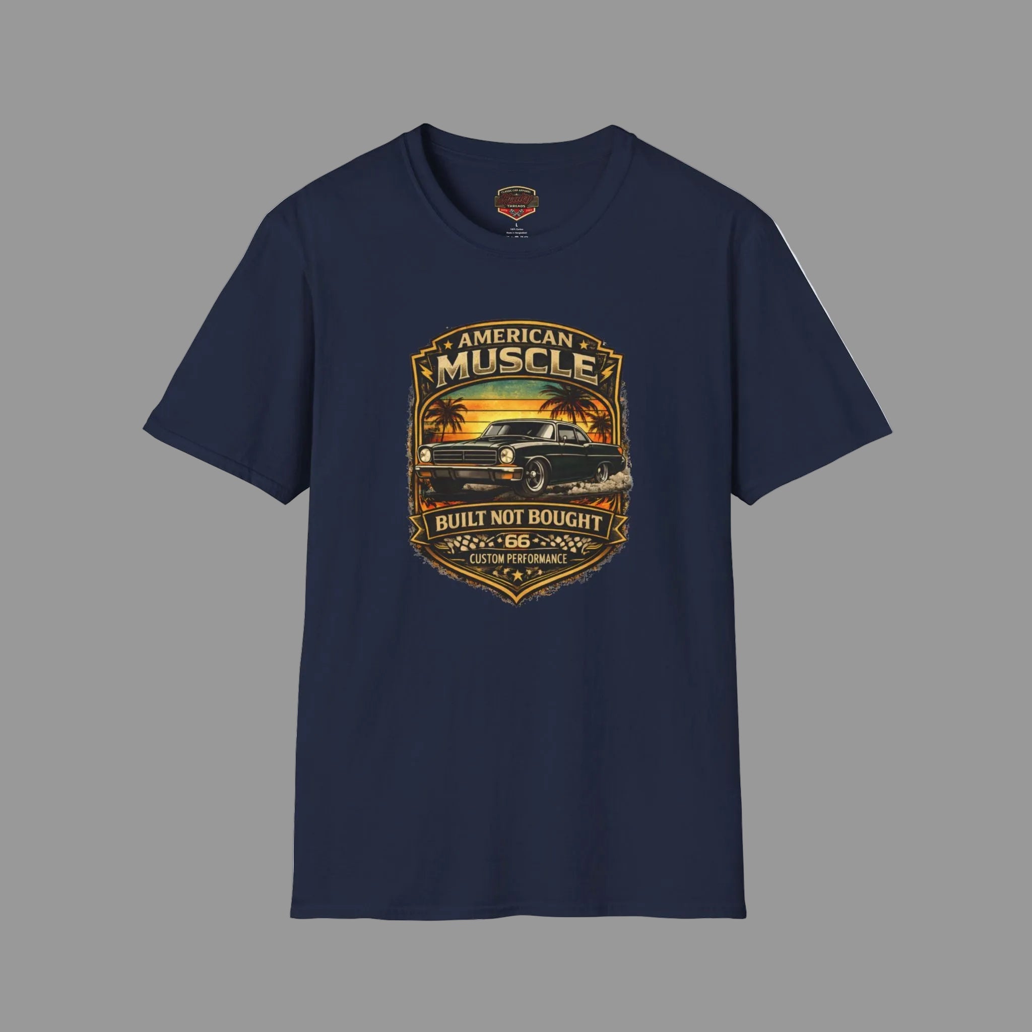 Navy blue t-shirt with a detailed classic car  graphic design on a gray background