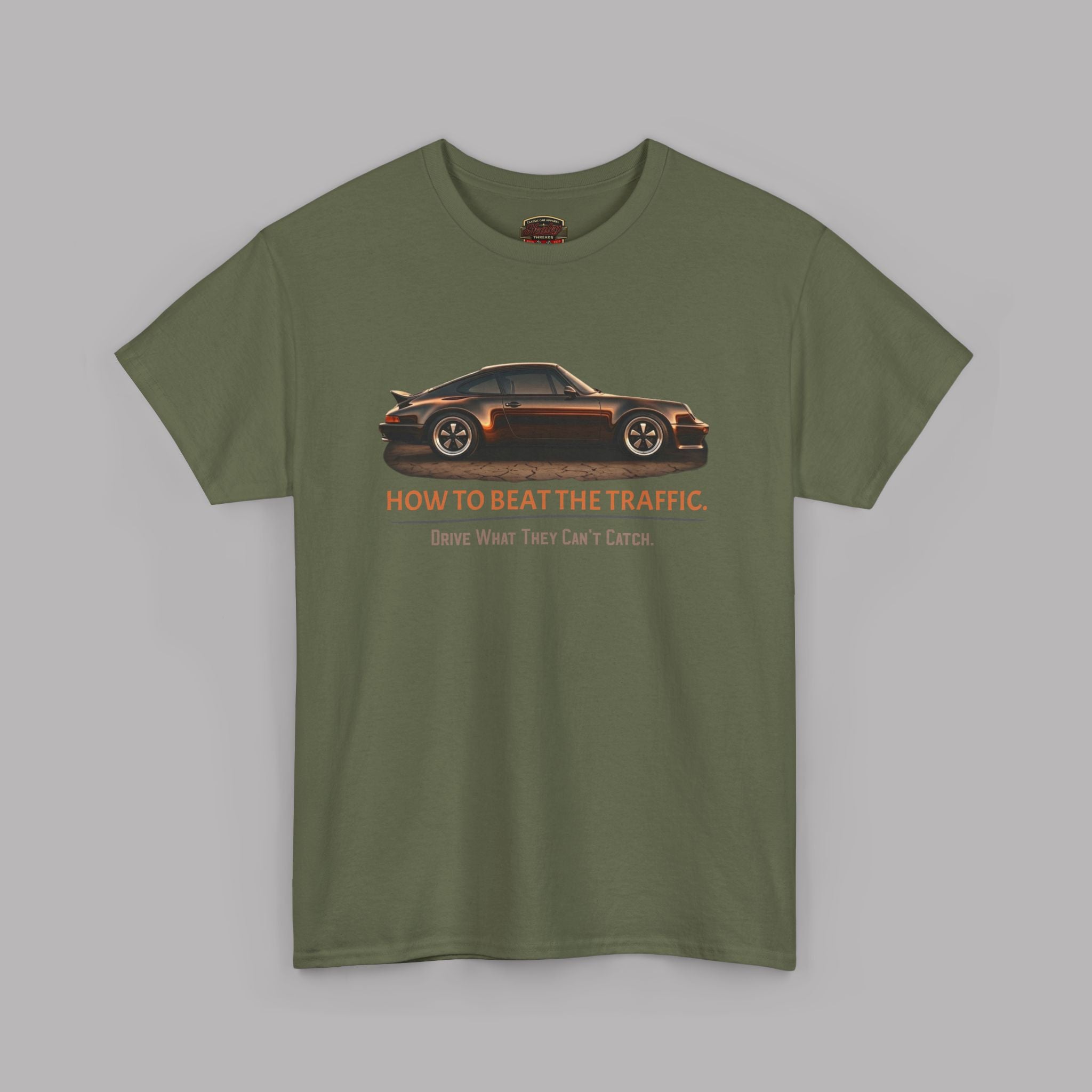 Military green t-shirt with a car graphic and text on a gray background
