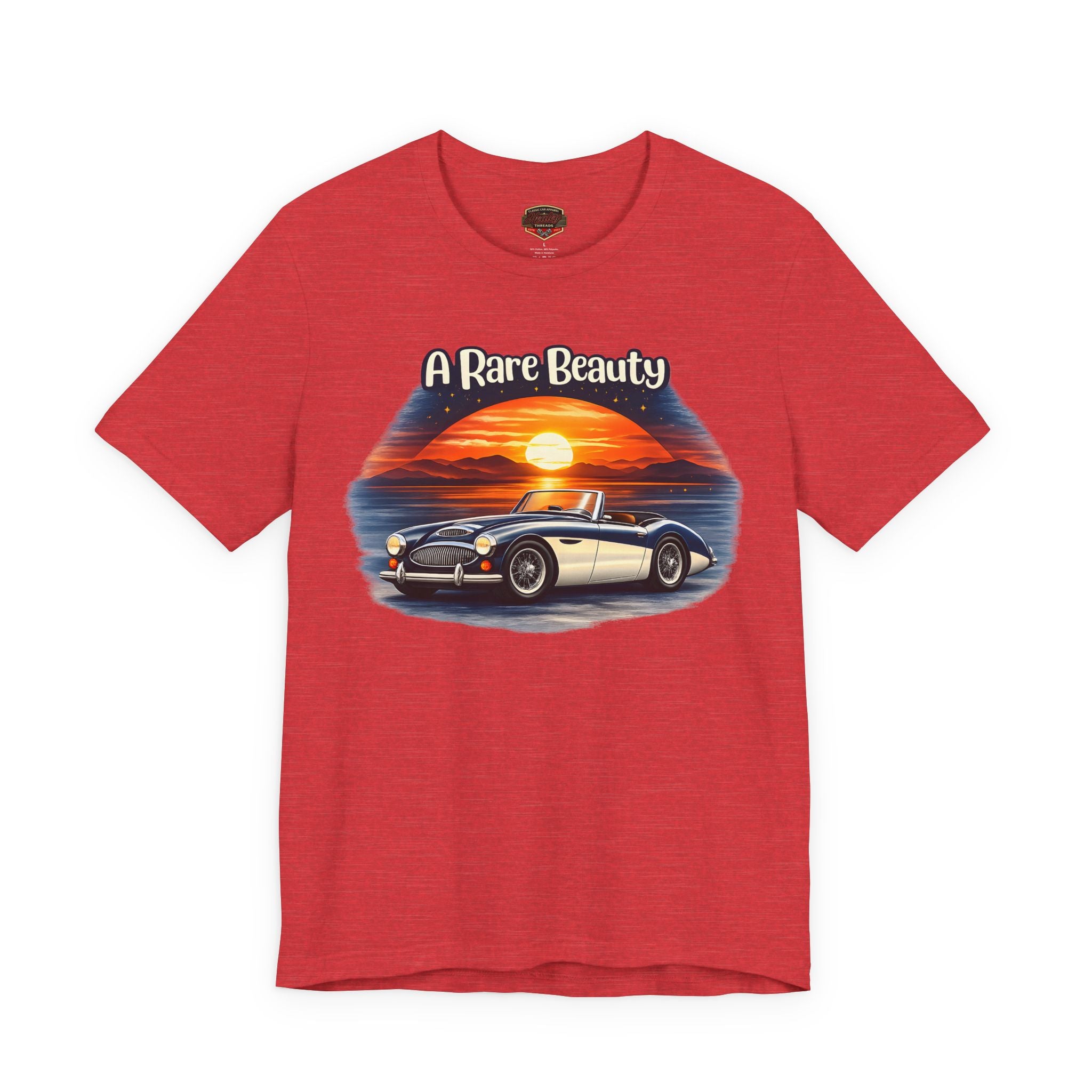 Heather red t-shirt with a graphic of a vintage Healey car and sunset, labeled 'A Rare Beauty', on a white background.