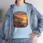 Woman wearing a light blue t-shirt with a classic red van graphic design and denim jacket.