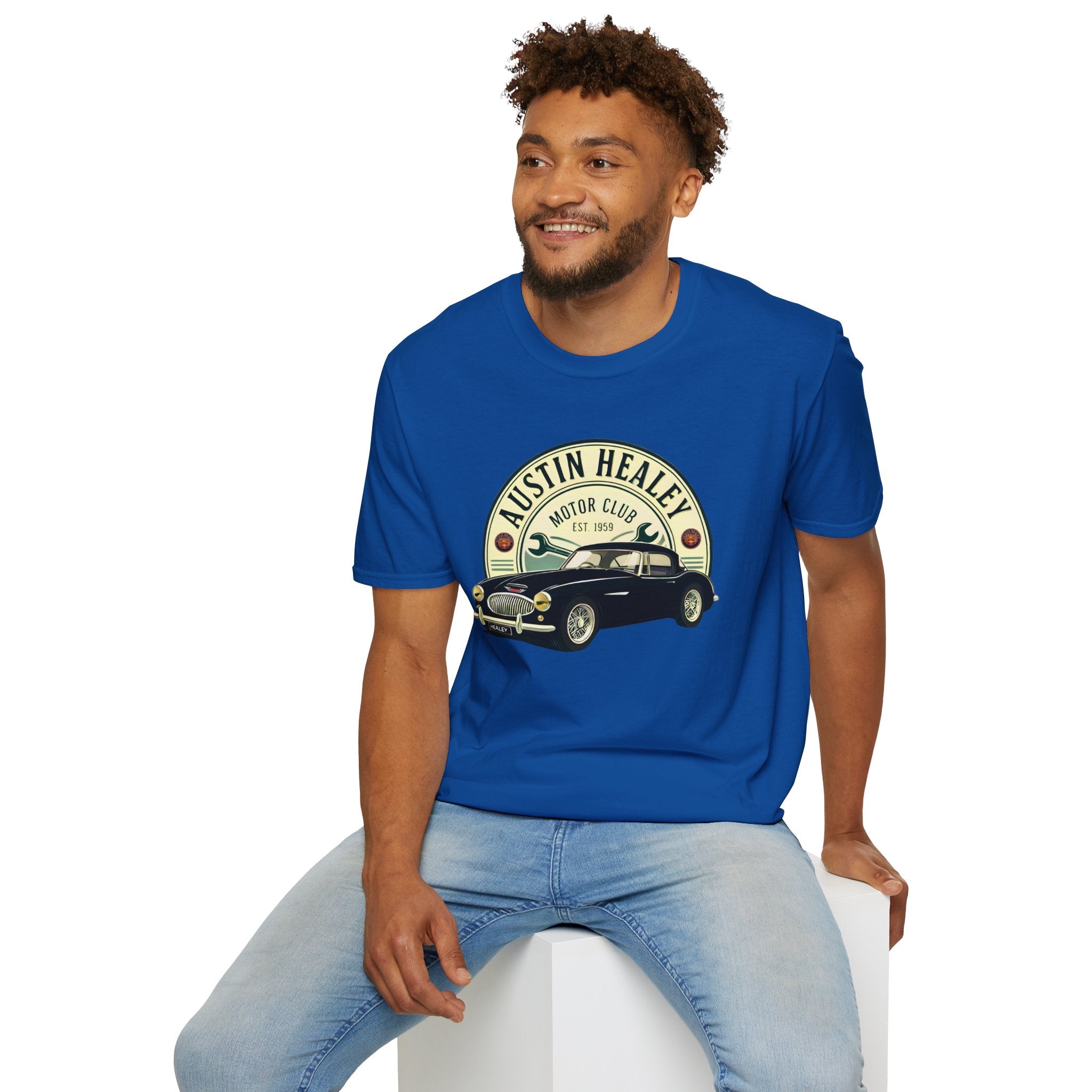 Man wearing a blue t-shirt with an Austin Healey graphic on a white background