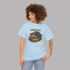 Woman wearing a light blue t-shirt with a classic car graphic design and text on a gray background