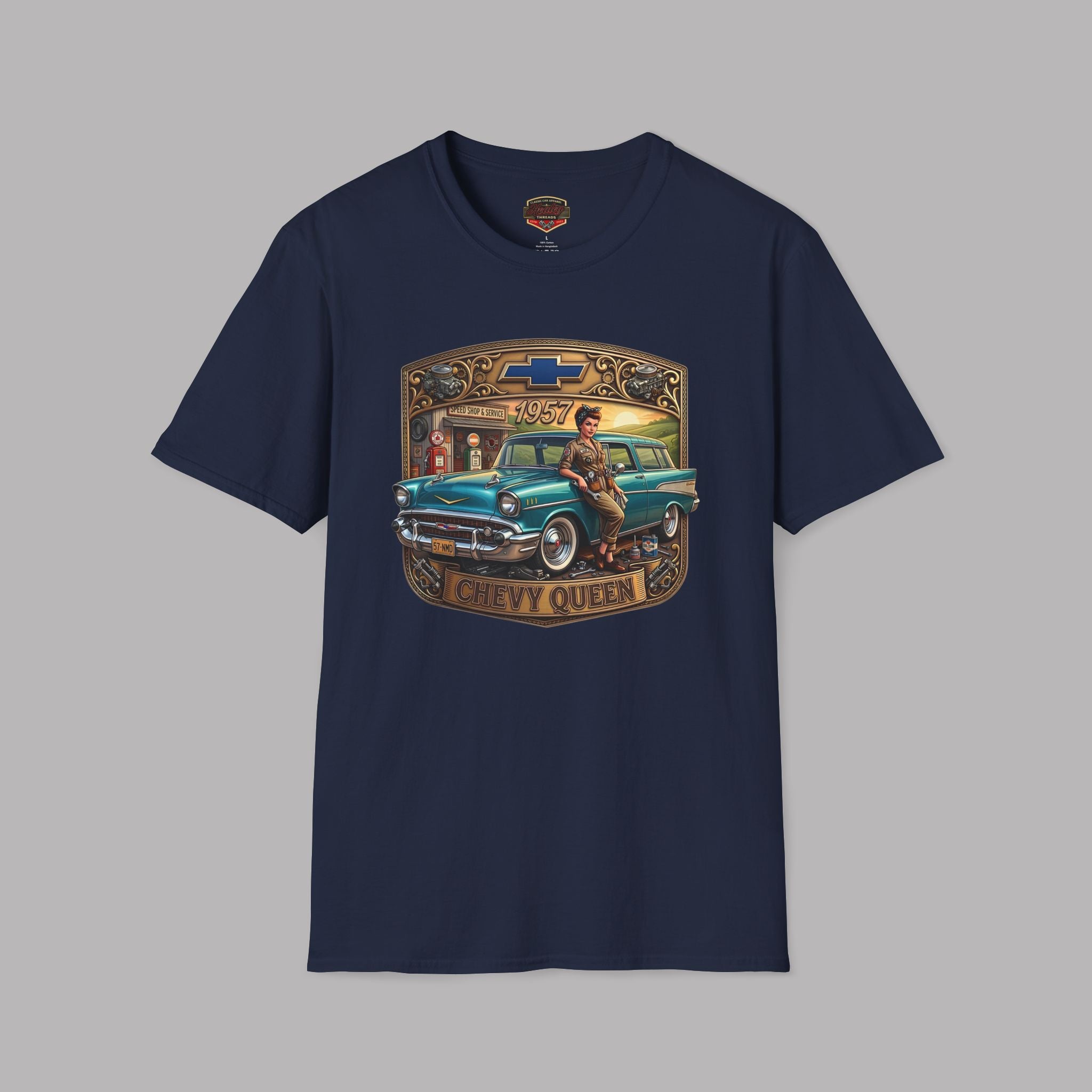 A navy blue short-sleeve t-shirt with a vintage-style graphic print on the front featuring a teal classic car, a cowboy, and the text 'Chevy Queen' with a Chevrolet bowtie logo.