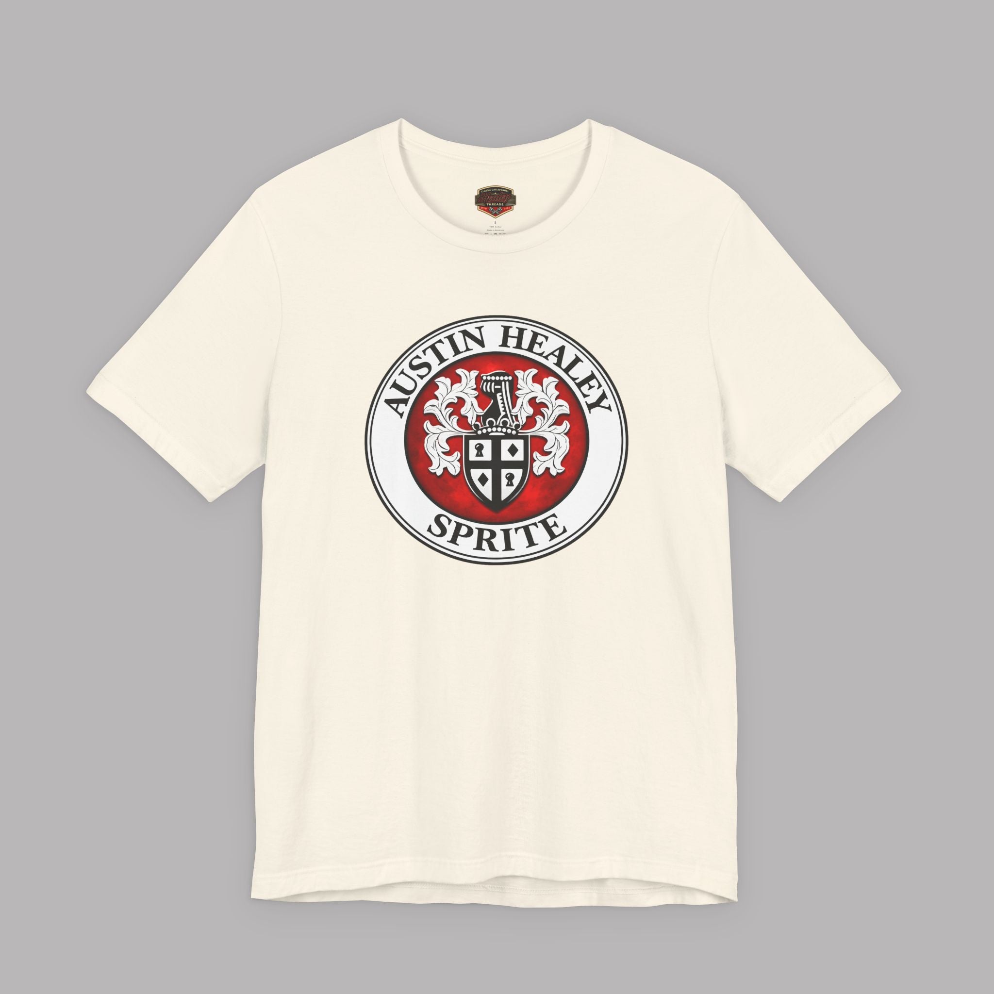 White t-shirt with Austin Healey Sprite logo on a gray background