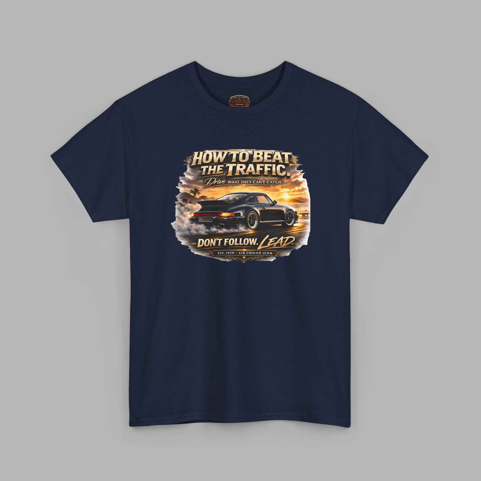 Navy blue t-shirt with a classic car graphic design on a gray background