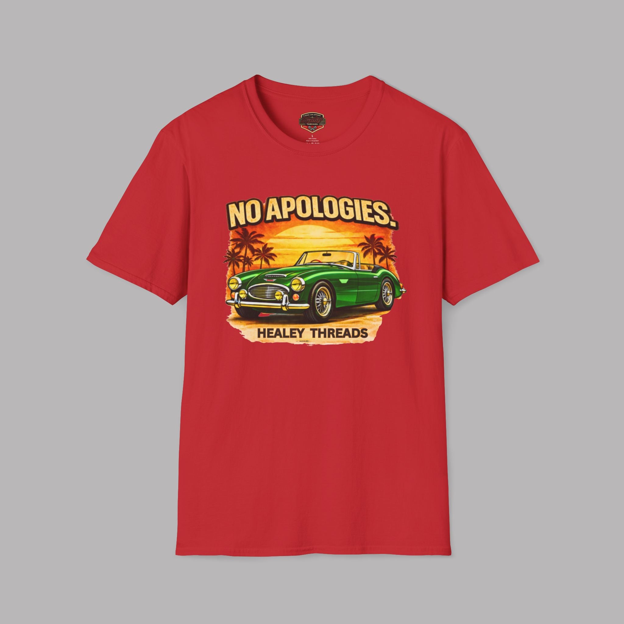 Red t-shirt with a graphic of a green classic car, palm trees, and 'No Apologies' text on a gray background.