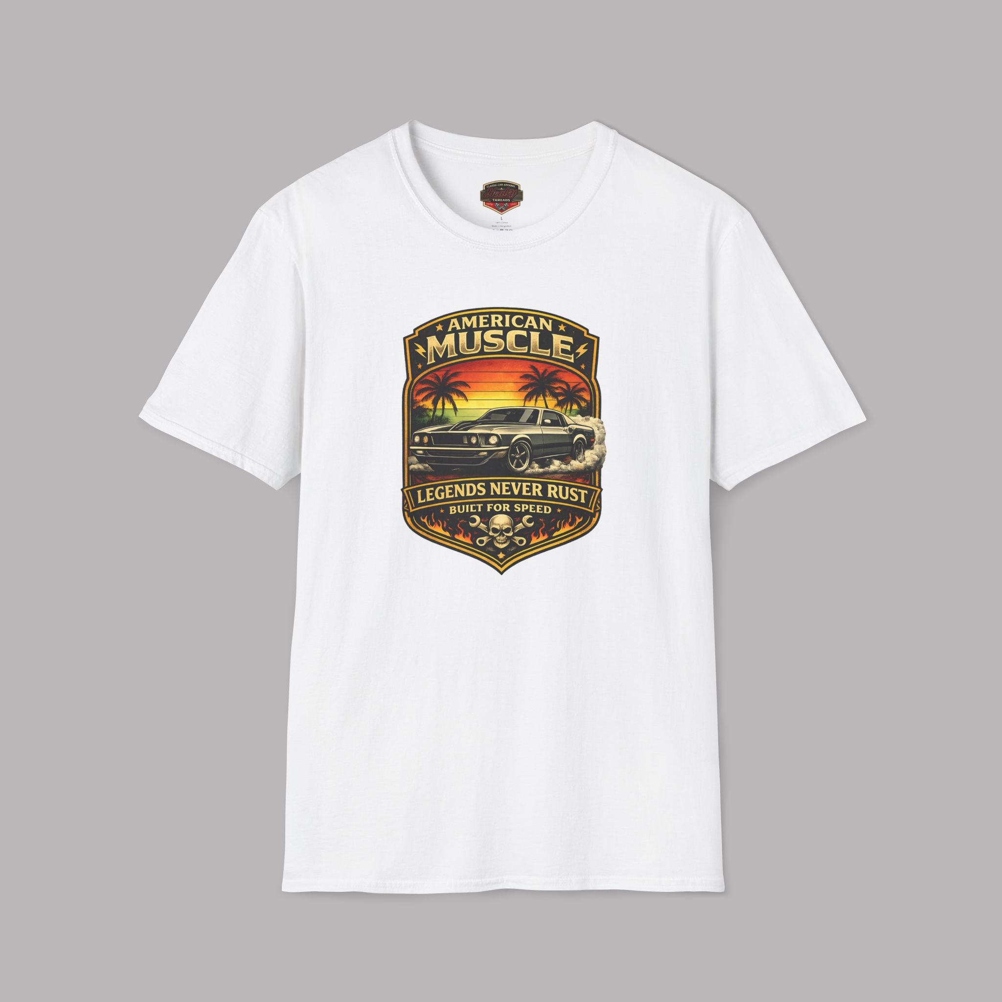 White t-shirt with a graphic car design on a gray background