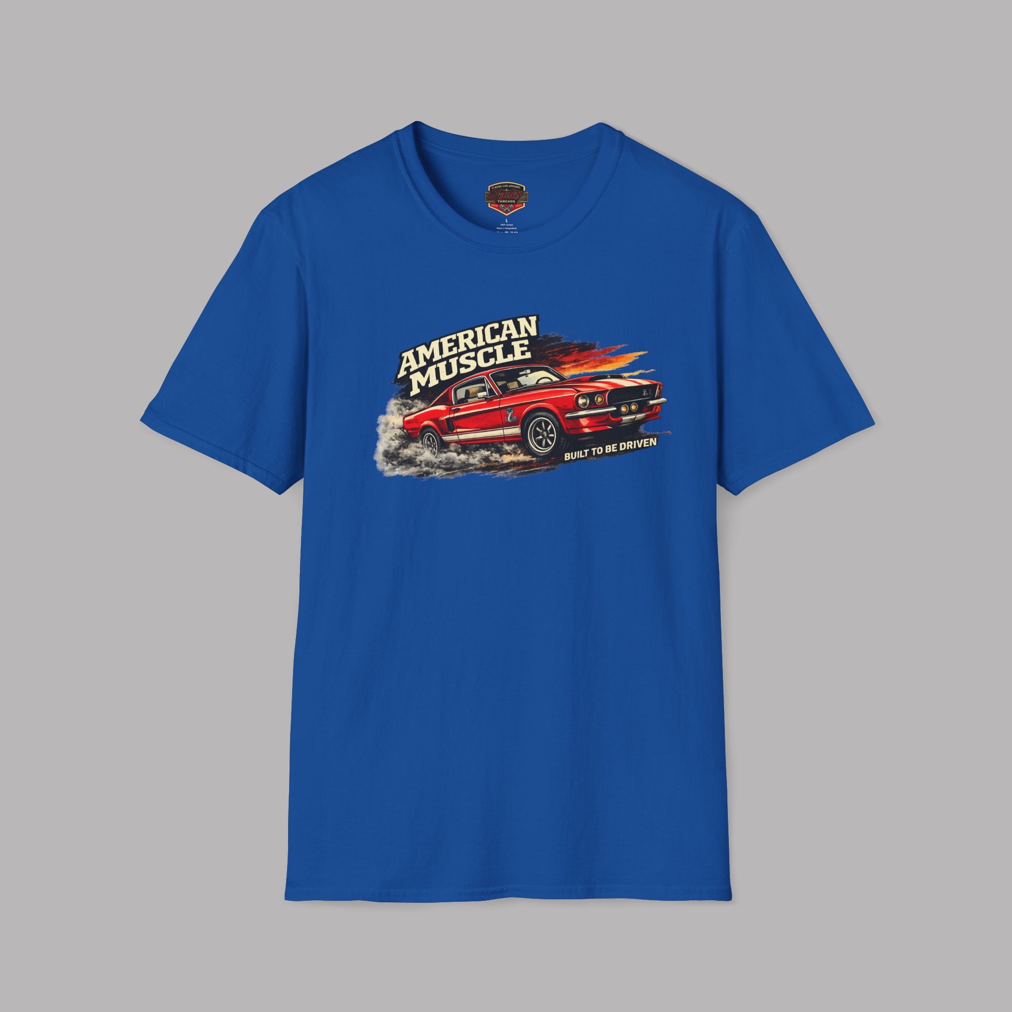 Royal blue t-shirt with a red muscle car graphic and 'American Muscle' text on a gray background