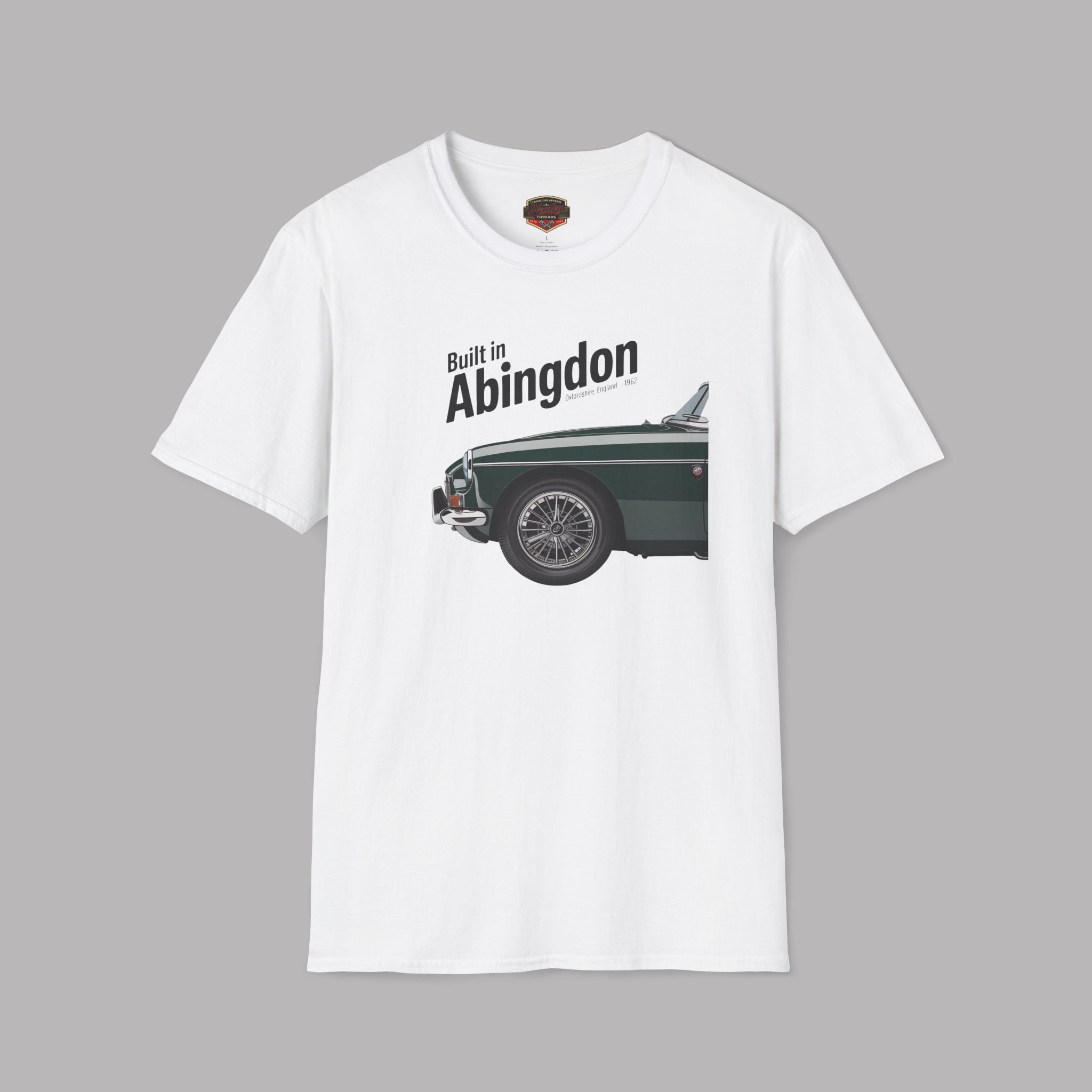 White t-shirt with a graphic of a classic car and text 'Built in Abingdon' on a gray background