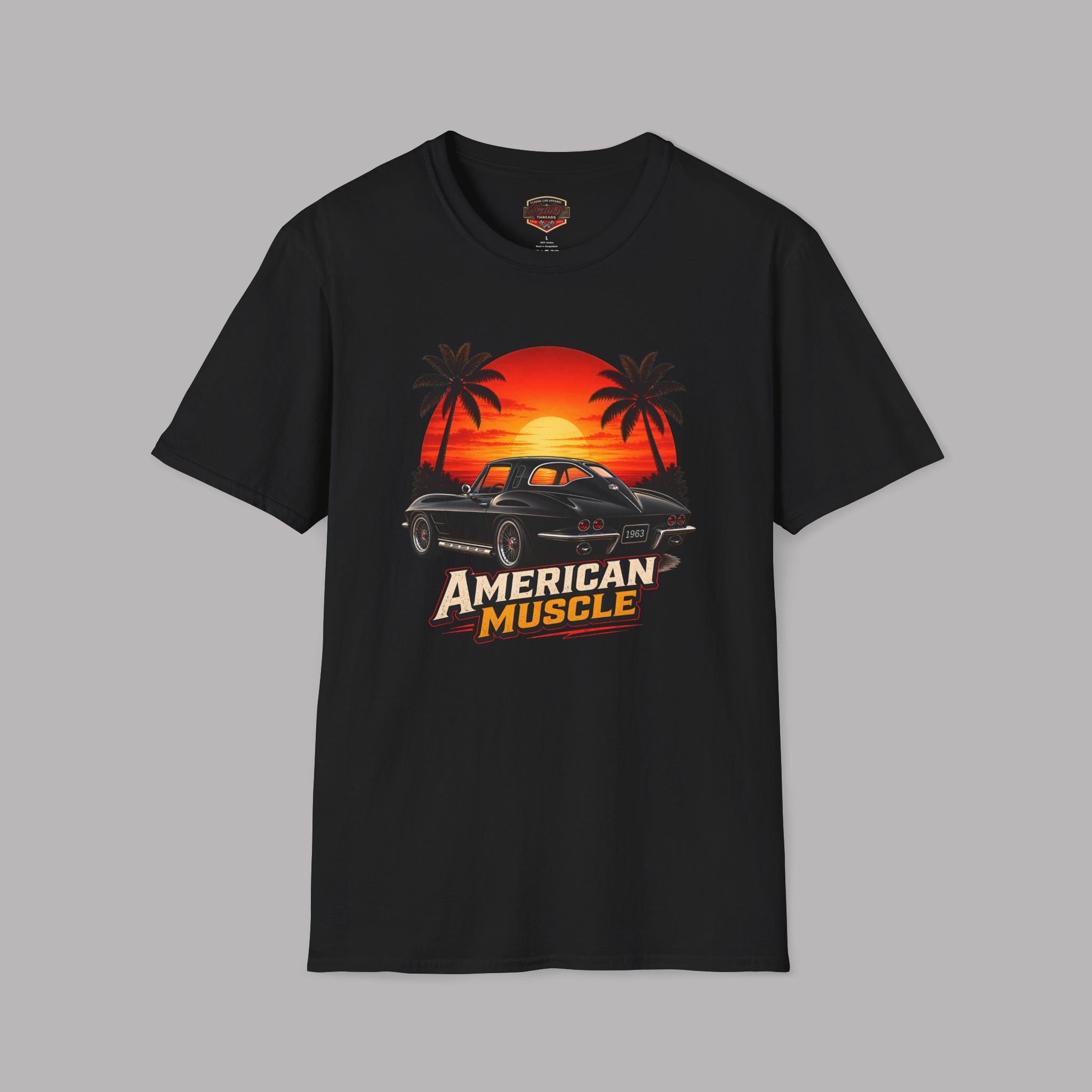 Black t-shirt with 'American Muscle' graphic design featuring a sunset and car on a gray background