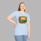 Woman wearing a light blue t-shirt with a classic car graphic design and text on a gray background