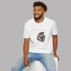 Man wearing a white t-shirt with a graphic supercharged engine design on a gray background
