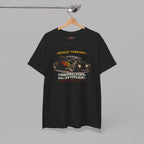 Black t-shirt with a hot rod graphic design and text on a hanger against a gray background