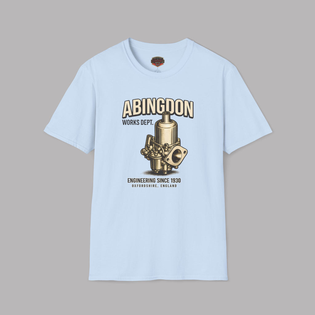 Light blue t-shirt with a mechanical design and text on a gray background