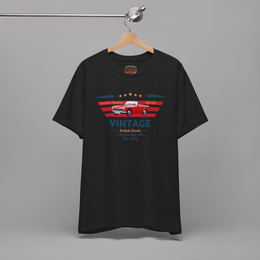 Black t-shirt with vintage car design on a hanger against a gray background