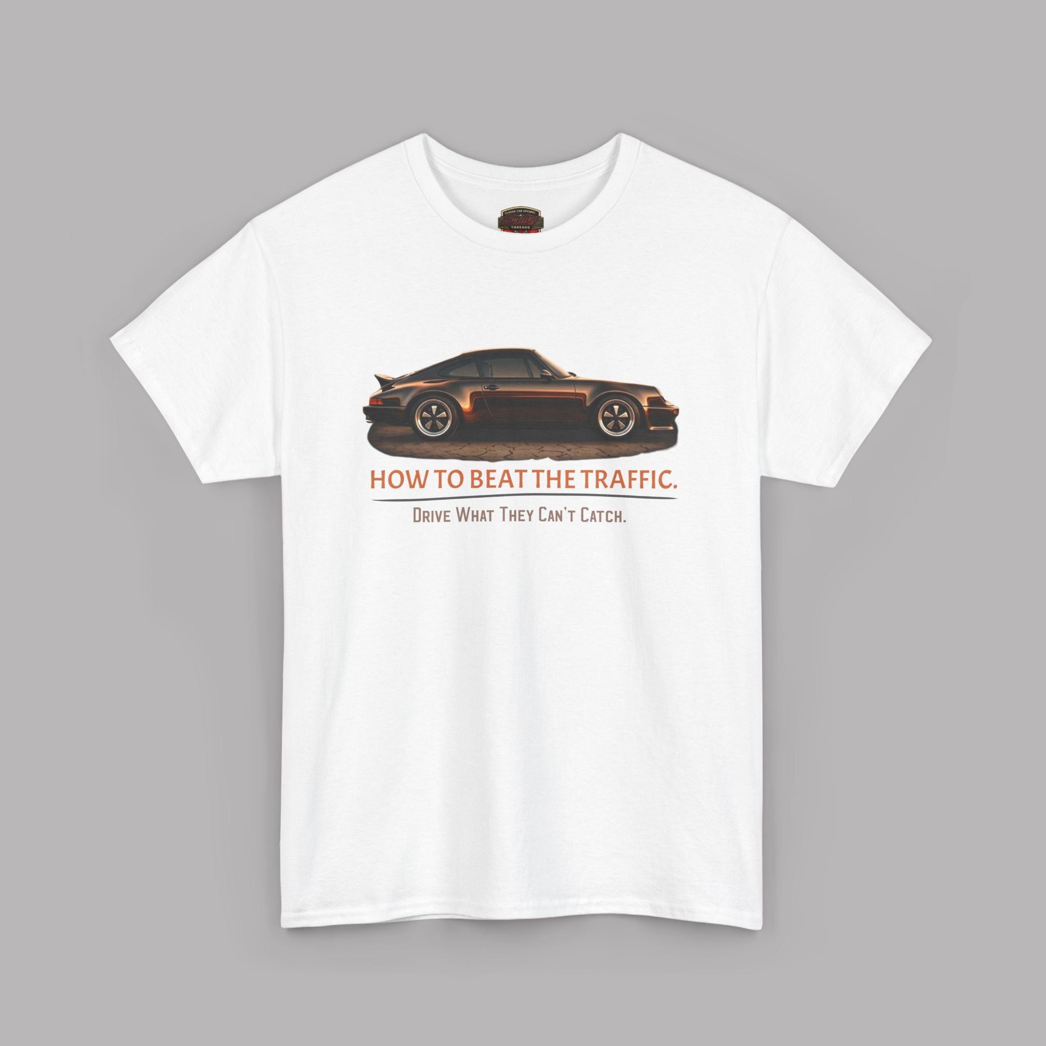 White t-shirt with a car graphic and text on a gray background
