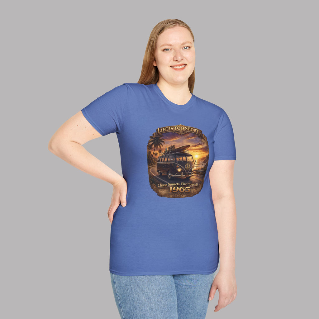 Woman wearing a Iris blue t-shirt with a graphic 1965 custom van design on a gray background