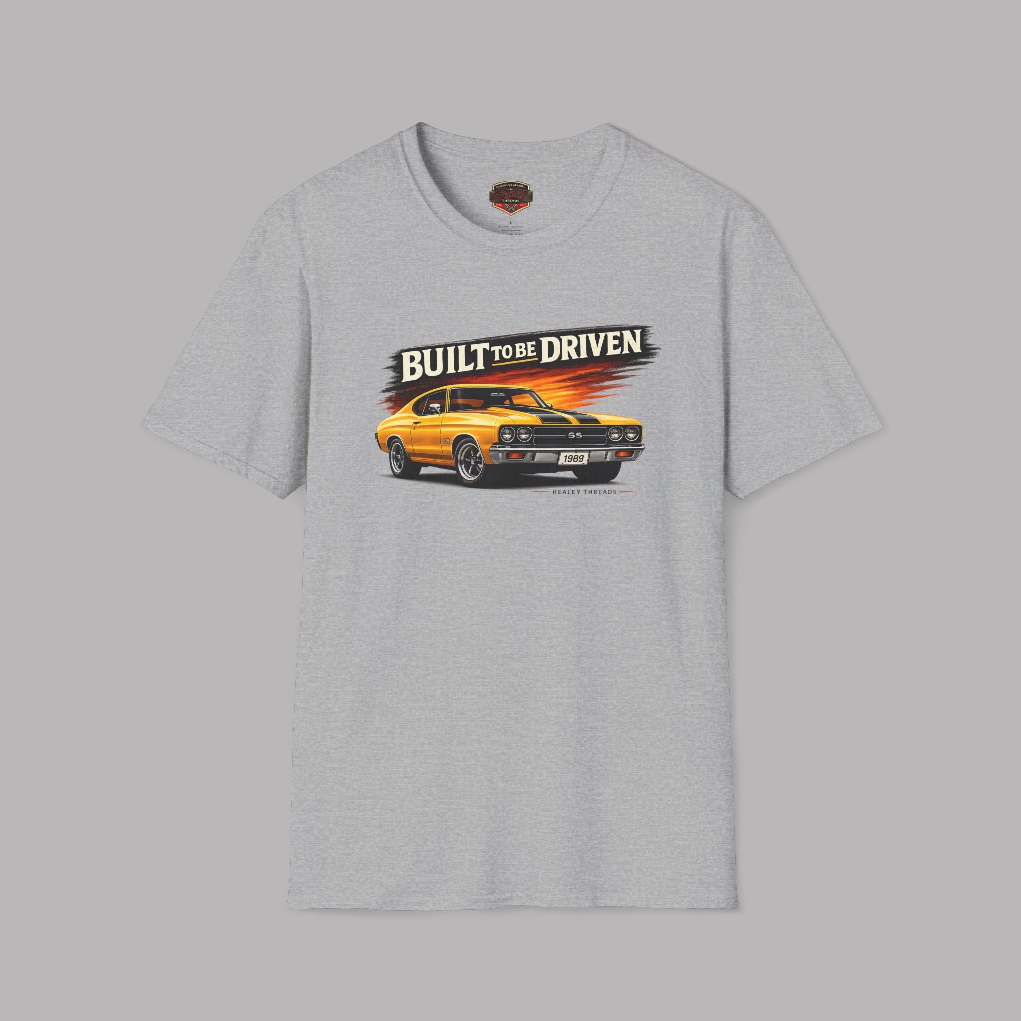 Sport gray t-shirt with a graphic of a car and 'Built to be Driven' text on a gray background