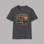 A dark gray crewneck t-shirt featuring a vintage-style graphic print of a green classic car with a gold sign that reads 'CHEVY GIRL' and '1955'. The Chevrolet bowtie logo is visible on the graphic and inside the collar label.