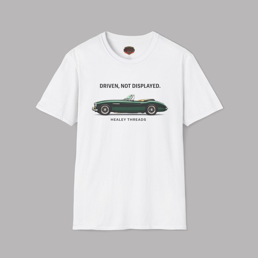 White t-shirt with a green classic car graphic and text on a gray background