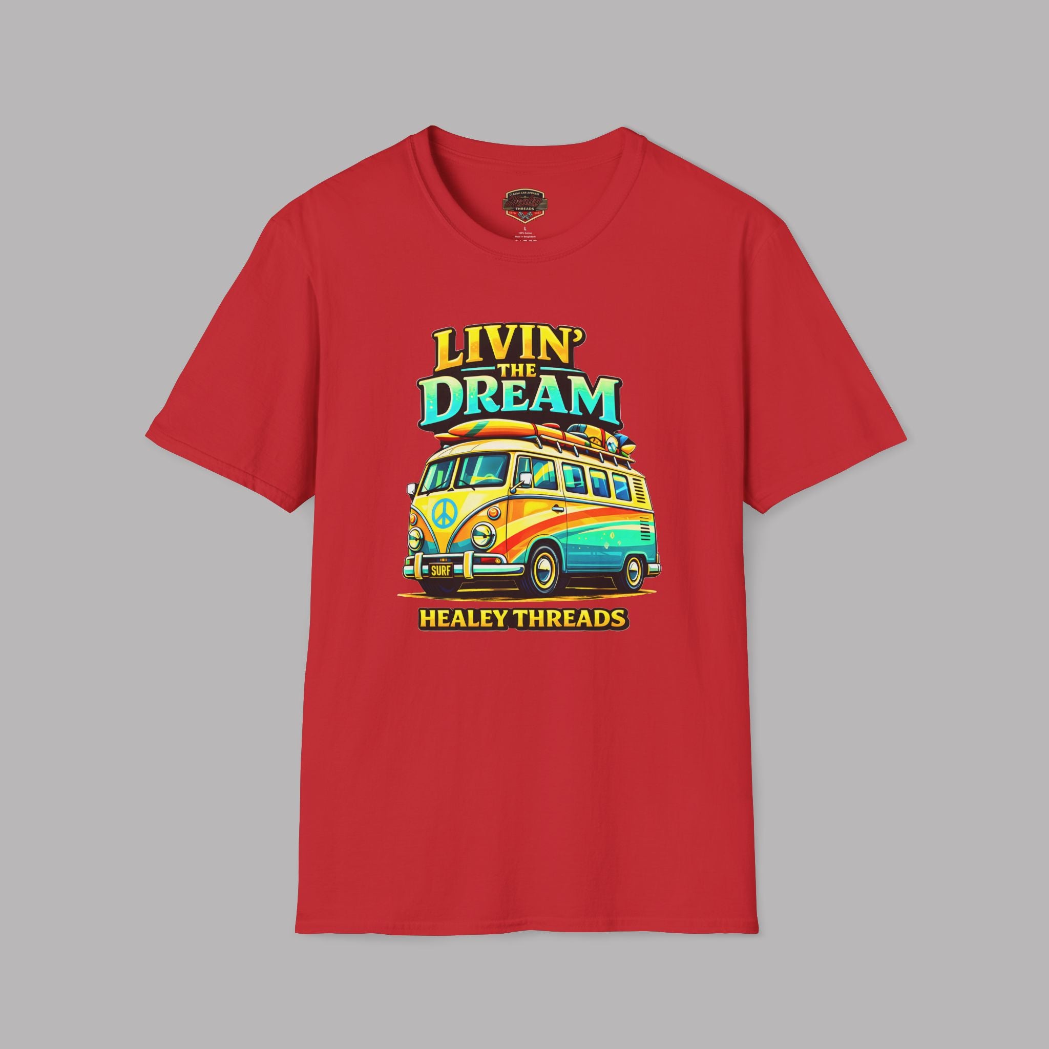 Red t-shirt with a colorful van graphic and text on a gray background