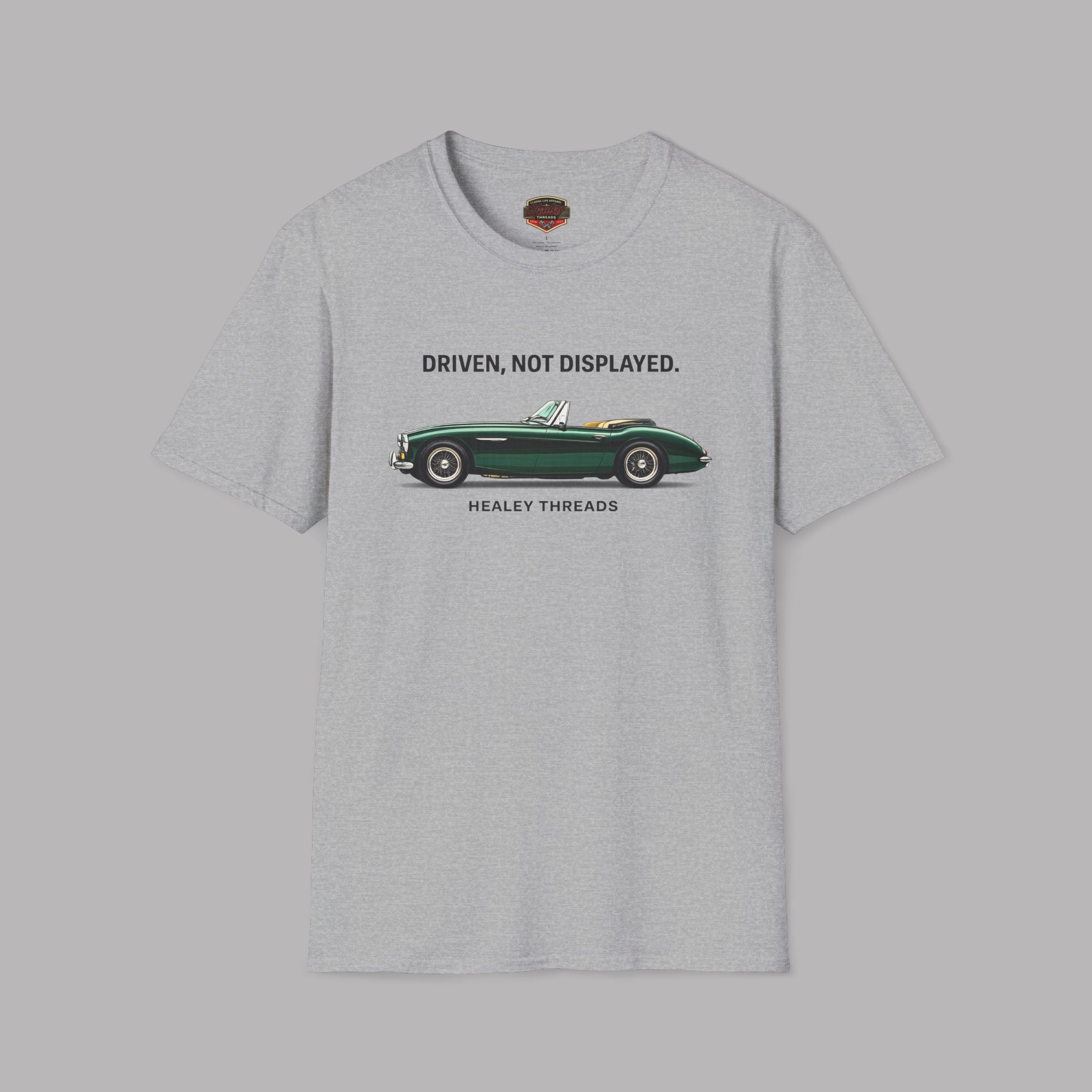 Sport gray t-shirt with a green classic car graphic and text on a gray background