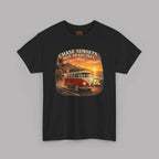 Black t-shirt with a graphic of a classic van and sunset text on a gray background