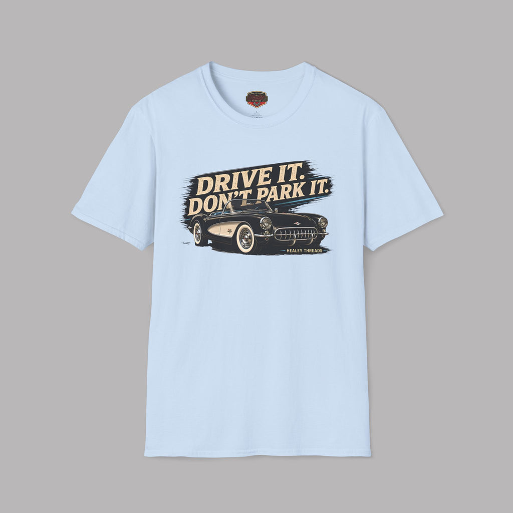 Light blue t-shirt with vintage graphic car design and text on a gray background