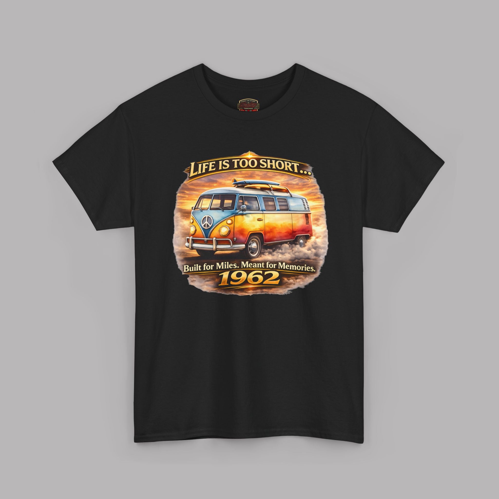 Black t-shirt with a vintage 1962 van graphic and text on a gray background
