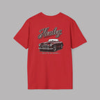 Back of a red t-shirt with a classic car graphic and 'Healey' text on a gray background