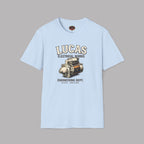 Light blue t-shirt with Lucas Electrical Works graphic on a gray background