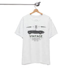 White t-shirt with vintage car graphic on a hanger against a white background