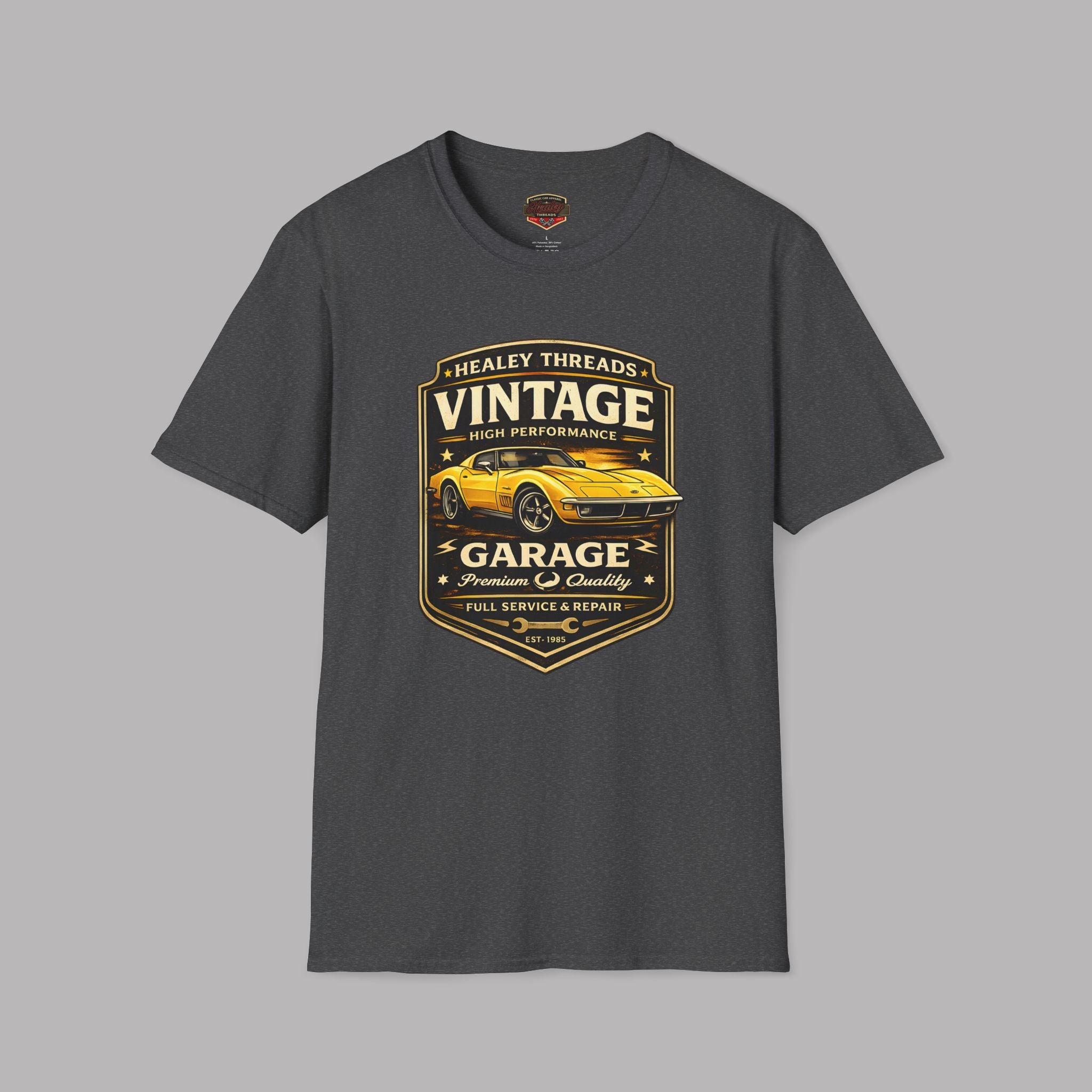 Dark heather t-shirt with vintage classic car  graphic on a gray background