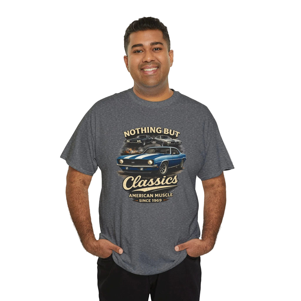 Man wearing a gray t-shirt with a graphic of a car and text on a white background