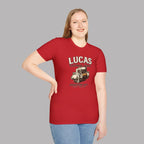 Woman wearing a red t-shirt with Lucas Electrical Works graphic on a gray background