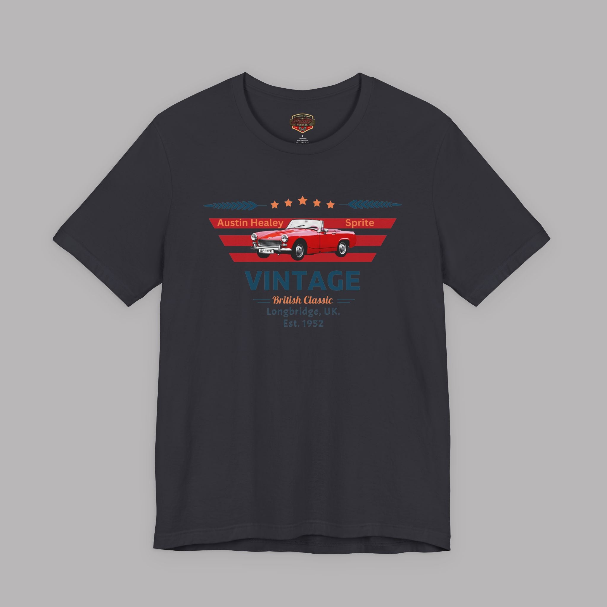 Dark heather t-shirt with vintage car graphic and text on a gray background 