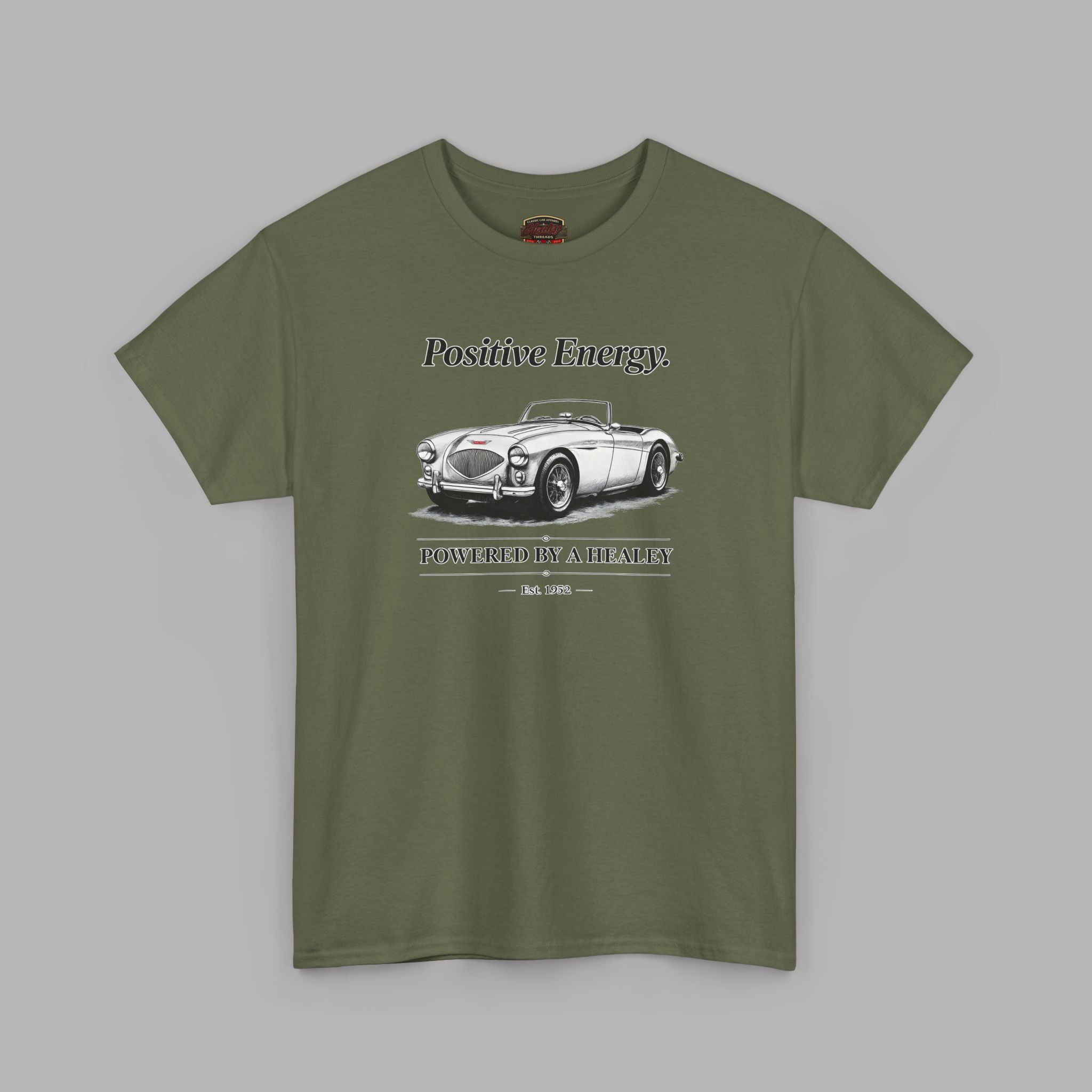 Military green t-shirt with a classic car graphic and text on a gray background