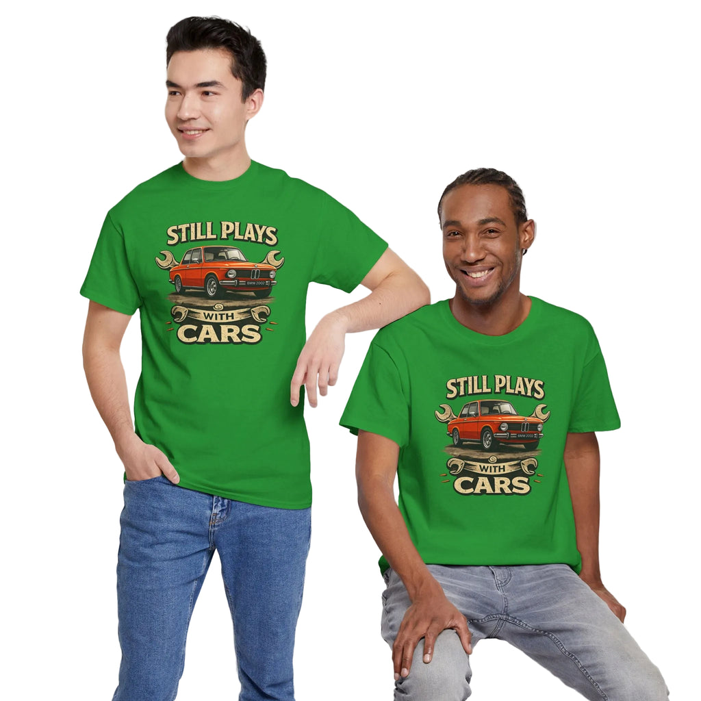 Two guys wearing green t-shirts with a car graphic and text on a white background
