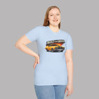 Woman wearing a light blue t-shirt with a car graphic and text on a gray background