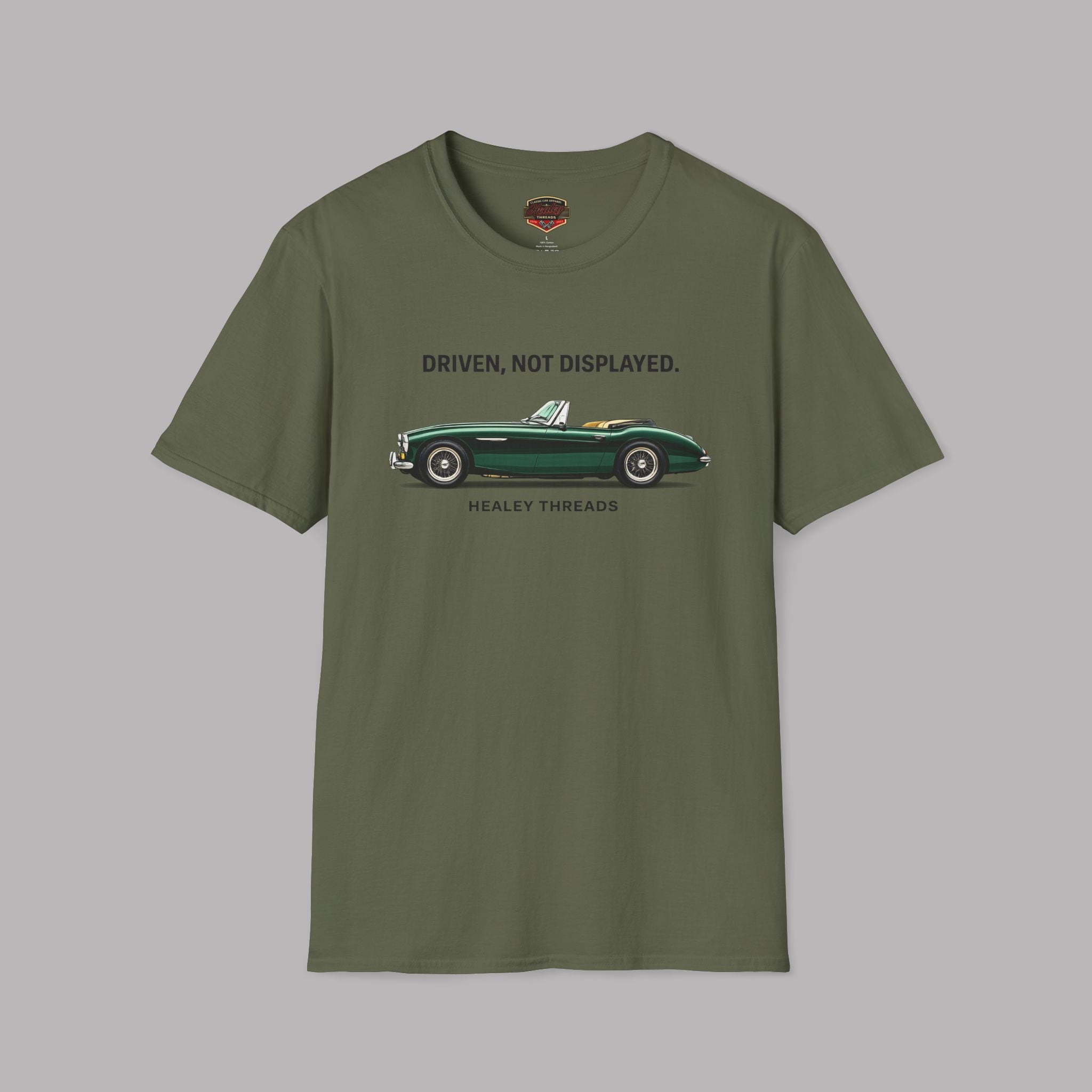 Military green t-shirt with a classic car graphic and text on a gray background