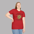 Woman wearing a red t-shirt with 'Coventry Engine Works'  graphic and text on a gray background