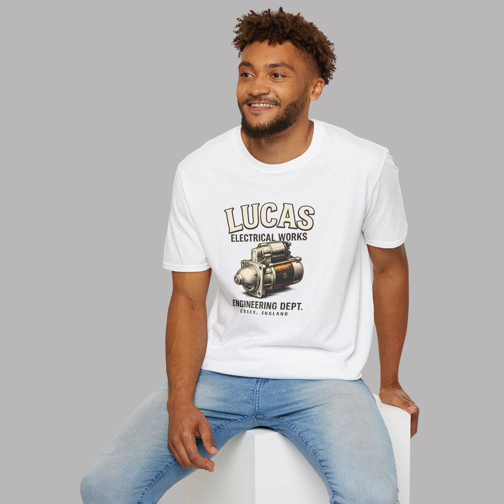 Man wearing a white t-shirt with 'Lucas Electrical Works' design on a gray background